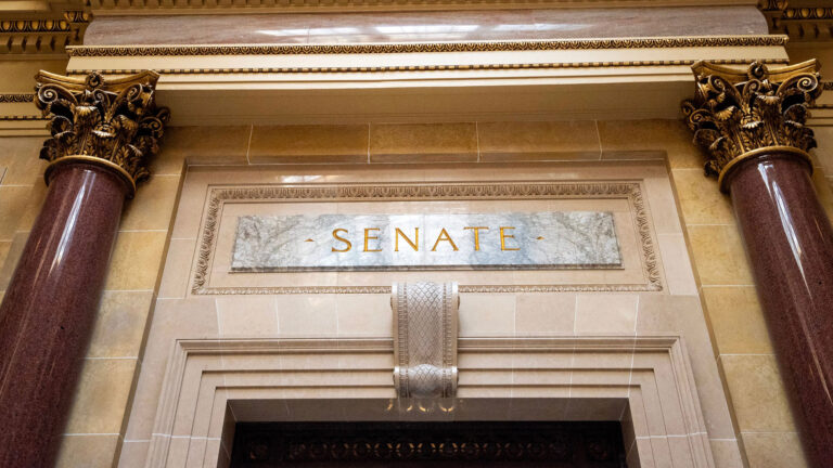 A marble SENATE sign in the Wisconsin State Legislature. A marble SENATE sign in the Wisconsin State Legislature.