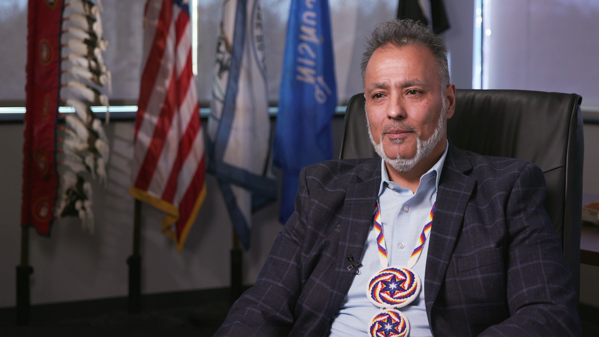 Indigenous Affairs Reporter Erica Ayisi interviews Ho-Chunk President Jon Greendeer, pictured here, about University of Wisconsin-Madison’s Tribal Educational Promise for Wisconsin’s Native students. (Source: PBS Wisconsin)
