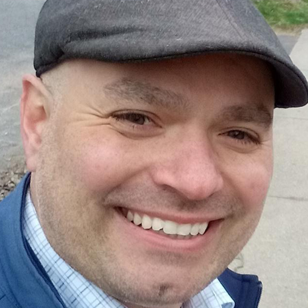 John Kroll poses for a portrait.