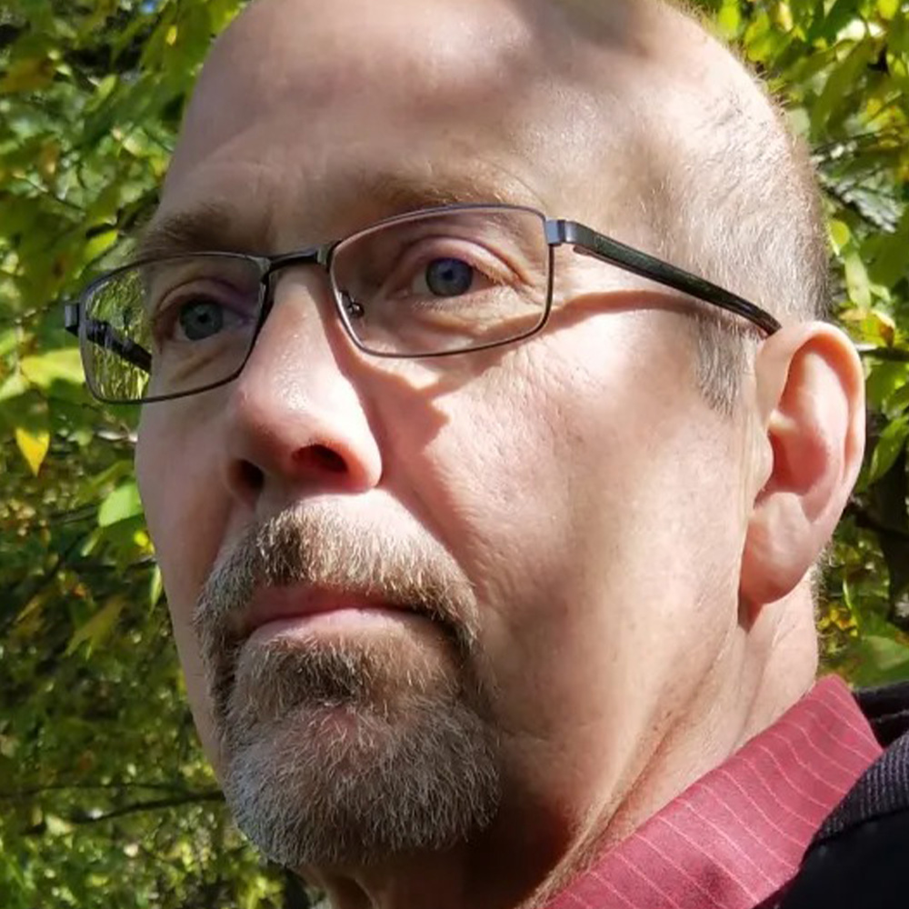 Keith Mogel poses for a portrait.
