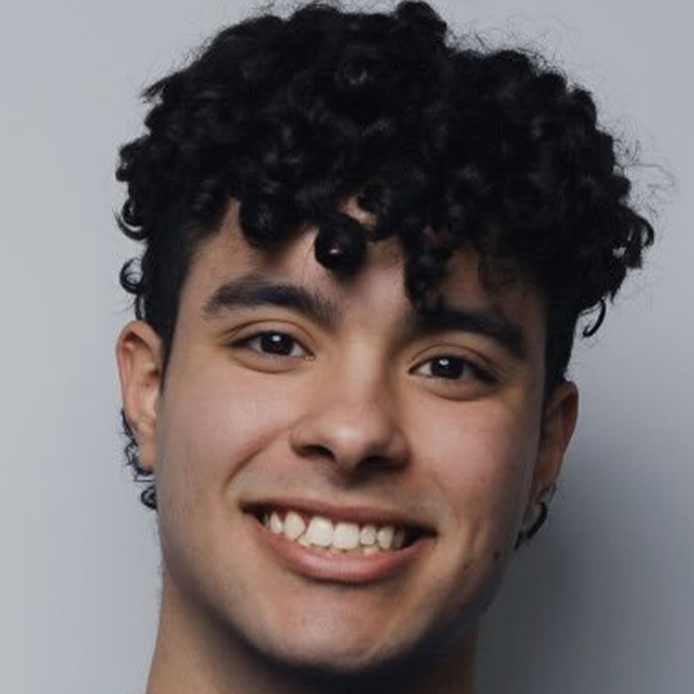 Nathan Tataje poses for a portrait.