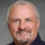 Paul McGraw poses for a portrait.