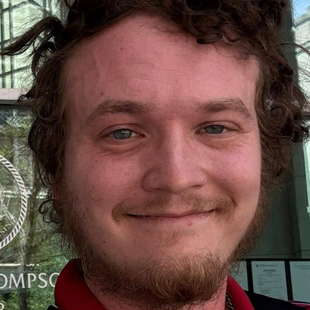 Zachary Commons poses for a portrait.