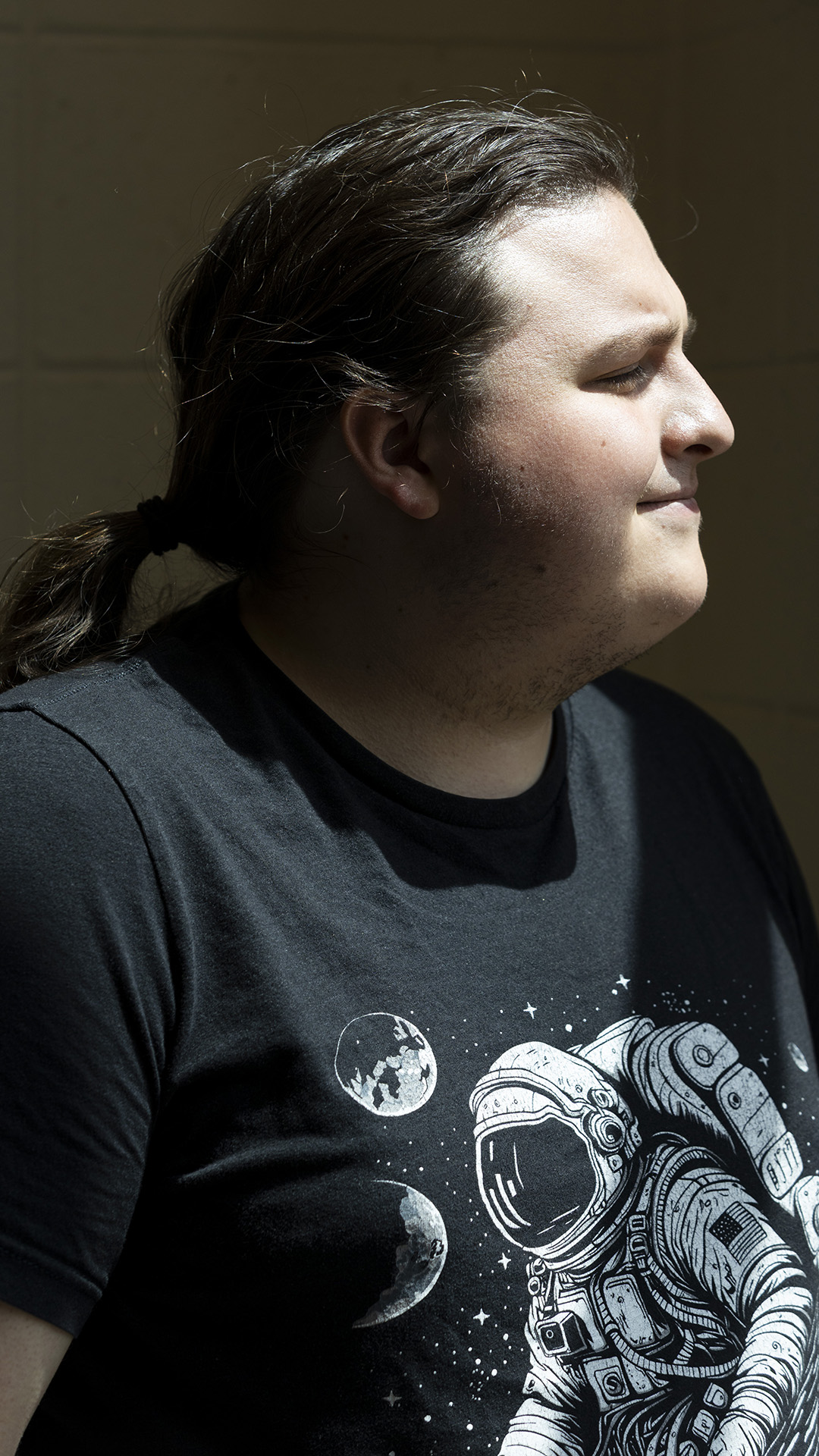 Matthew Jacobson poses for a portrait in profile.