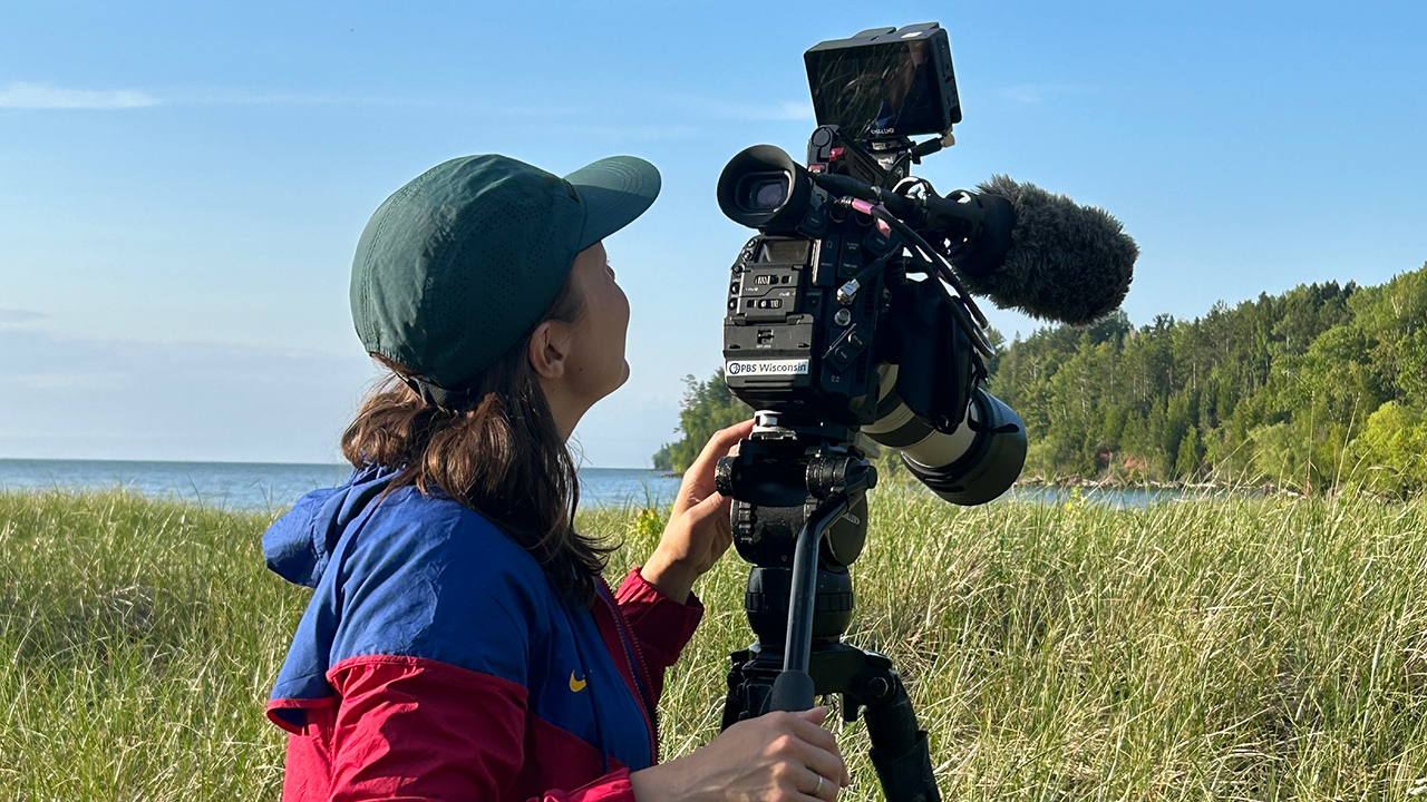 PBS Wisconsin Videographer Lina Soblyte films in Cornucopia for Wisconsin’s Scenic Treasures. (Source: PBS Wisconsin)