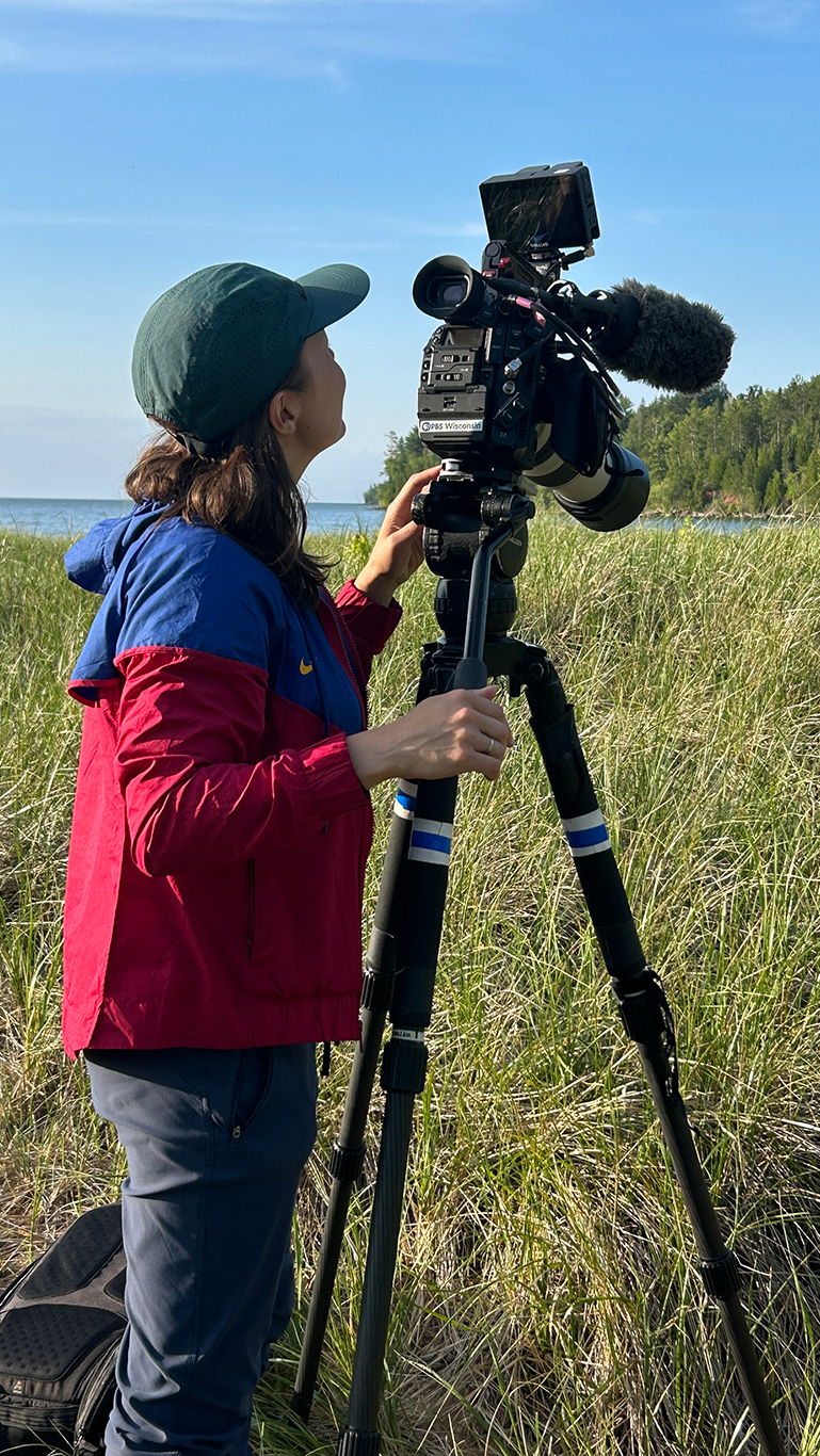 PBS Wisconsin Videographer Lina Soblyte films in Cornucopia for Wisconsin’s Scenic Treasures. (Source: PBS Wisconsin)