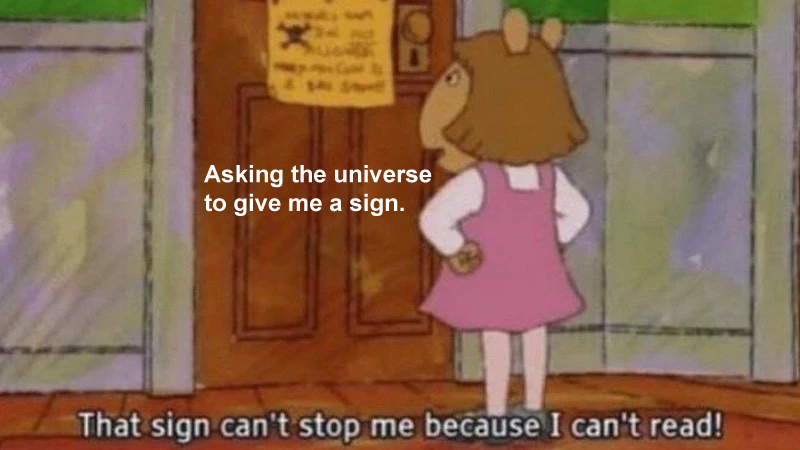 A screenshot from the PBS KIDS show "Arthur" shows the character D.W. standing outside a room saying "That sign can't stop me because I can't read!" Text above reads: "Asking the universe to give me a sign."